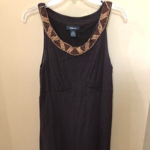 Brown dress with wooden beaded collar
